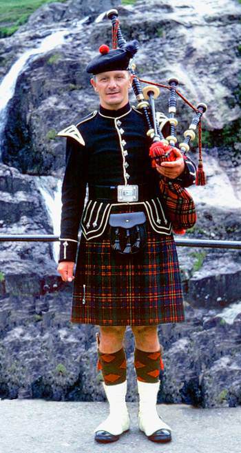Highland piper in kilt